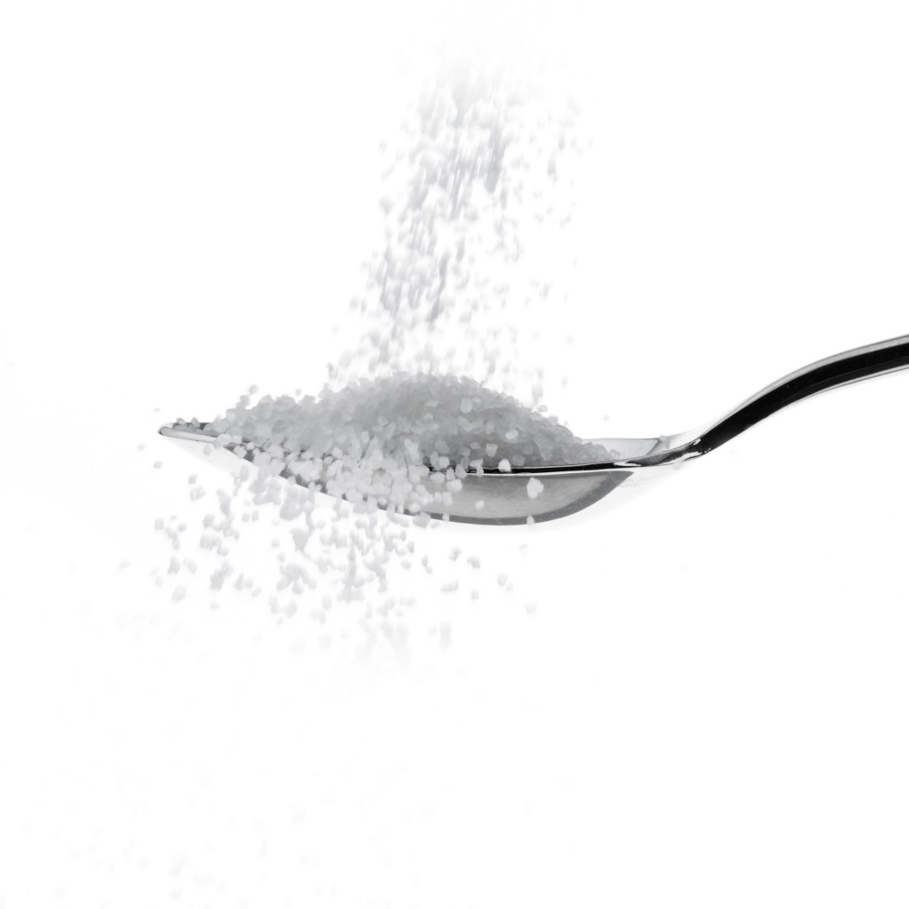 Fine granulated sugar on a spoon